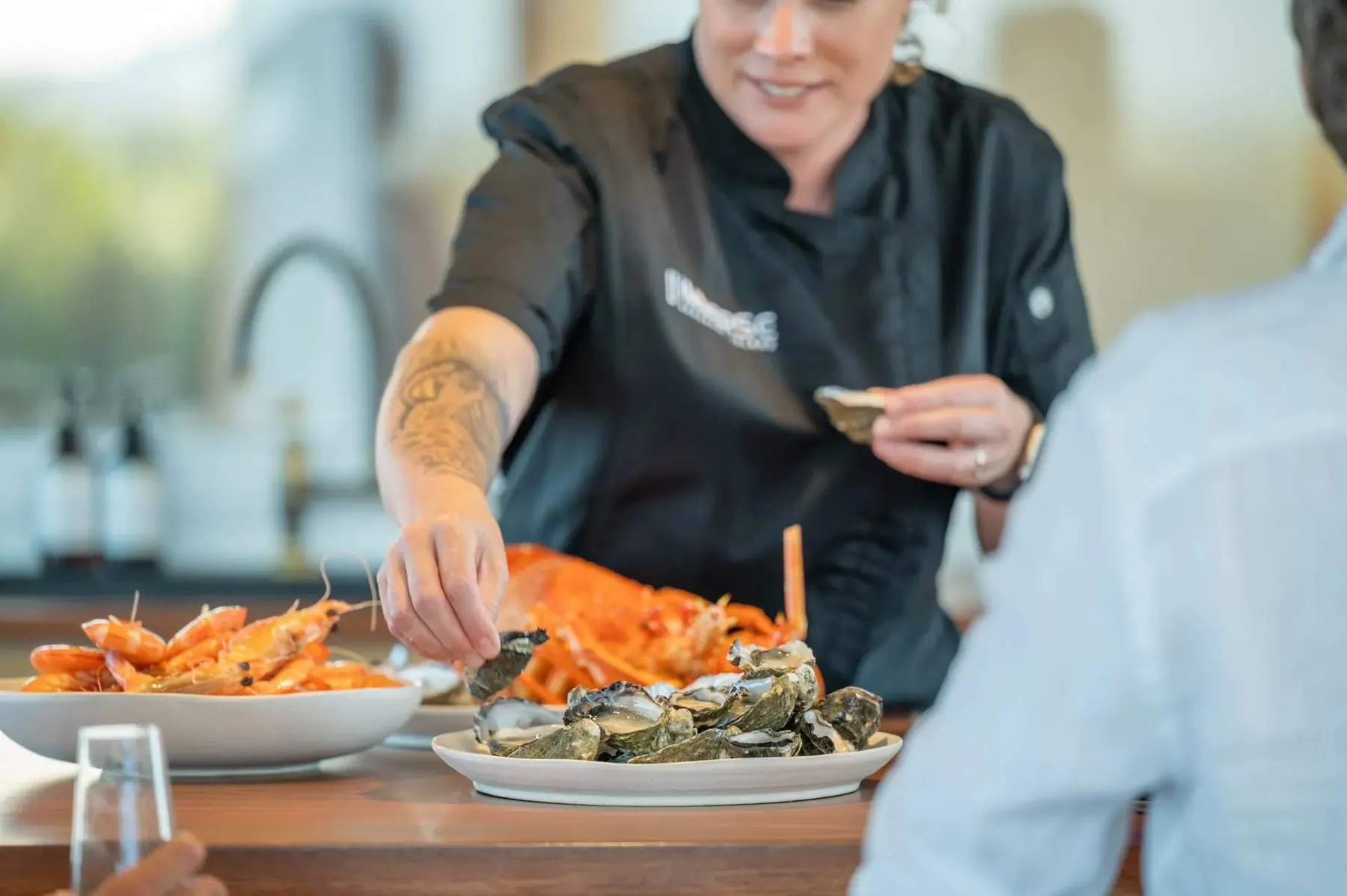 A private chef plating dinner at Immerse Kangaroo Island